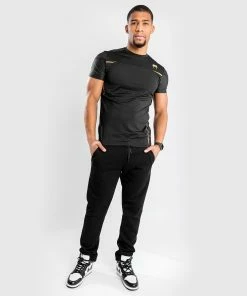 Venum Tempest 2.0 Dry Tech T-shirt - Black/Gold -Venum Shop 2 252Fa 252Ff 252F4 252F2af4cf0919c8dc6330f5e2f4b49cf7a4380256e0 DRYTECH TEMPEST2.0 BLACK GOLD 05 c8a52846 918b 4940 a869 2bb6331c91af