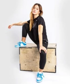 Venum Glow T-Shirt - For Women - Black -Venum Shop 4 252F6 252F1 252F3 252F46135ce768e99ceba3d3af19b8fc3537aceb31ab TS GLOW BLACK WOMEN2