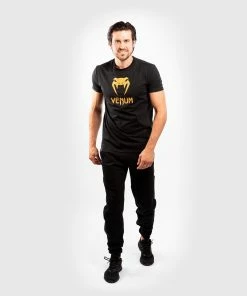 Venum Classic T-shirt - Black/Gold -Venum Shop b 252F6 252F7 252Fd 252Fb67d3e873404886714a09e2feb803726275b626a TS CLASSICS BLACK GOLD 08