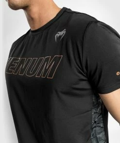 Venum Classic Evo Dry Tech T-shirt - Black/Bronze 11 Venum Classic Evo Dry Tech T-shirt - Black/Bronze -Venum Shop f 252F3 252Fa 252F4 252Ff3a4d7e7b0cec703f3f892484d727a473c02920b DRYTECH CLASSIC EVO BLACK 07